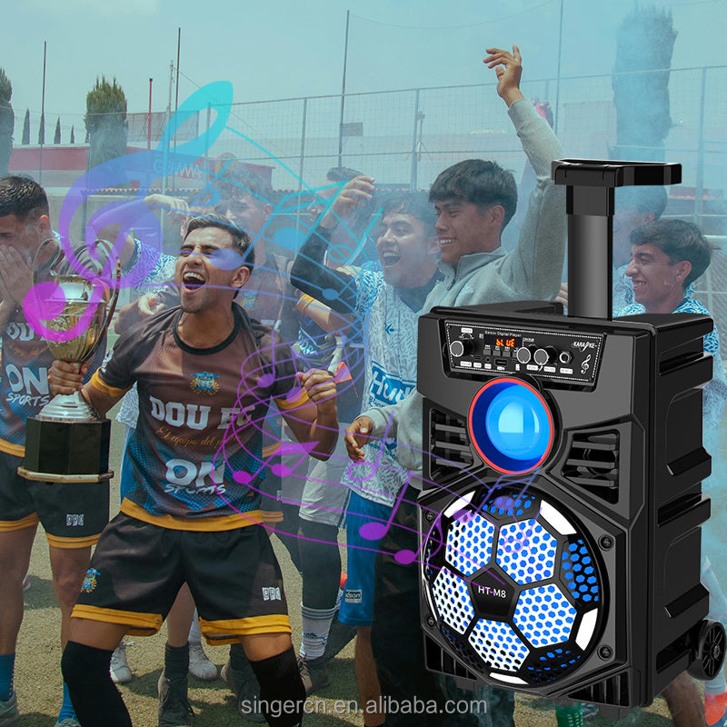 HT-M8 altoparlant party Bluetooth 8 inç me trolley, Bluetooth 5.0, 2 mikrofona pa tela, drita RGB LED, radio FM, mbështetje për kartë TF, telekomandë dhe bateri të rikarikueshme. Ideal për karaoke, festa, evente dhe përdorim në ambiente të jashtme. 